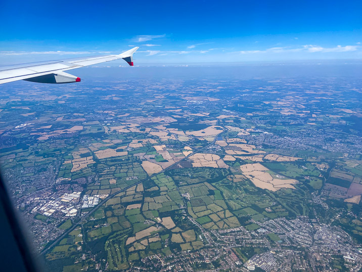 England looks different from above. They call it enclosure, all the hedges around their fields.